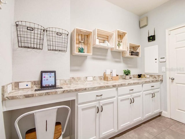 bathroom with tile patterned flooring