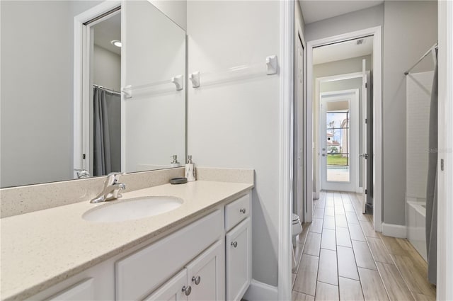 bathroom with vanity and toilet