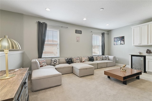 carpeted living room featuring a wealth of natural light