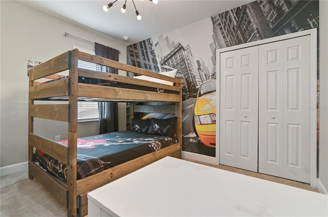 carpeted bedroom with a closet