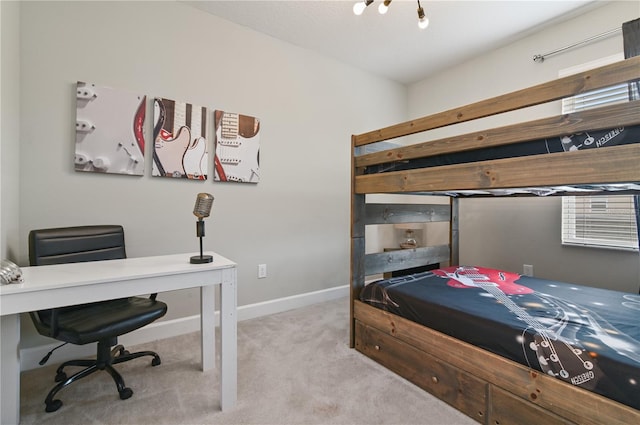 bedroom featuring light carpet