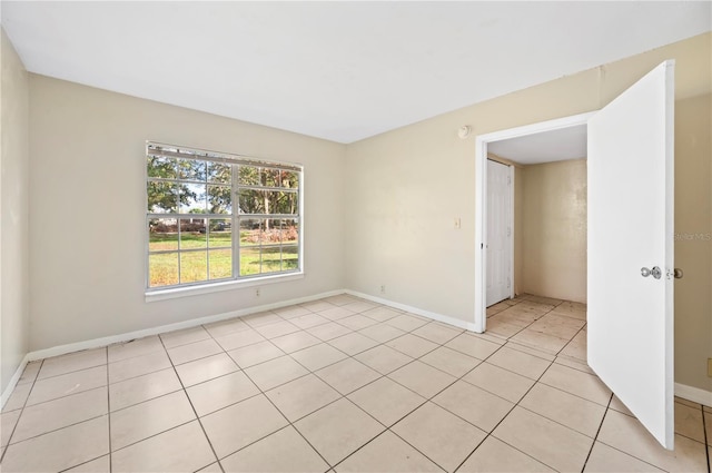 view of tiled spare room