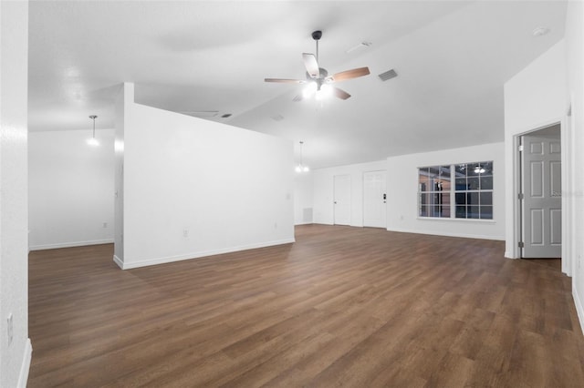 unfurnished living room featuring ceiling fan, dark hardwood / wood-style floors, and lofted ceiling