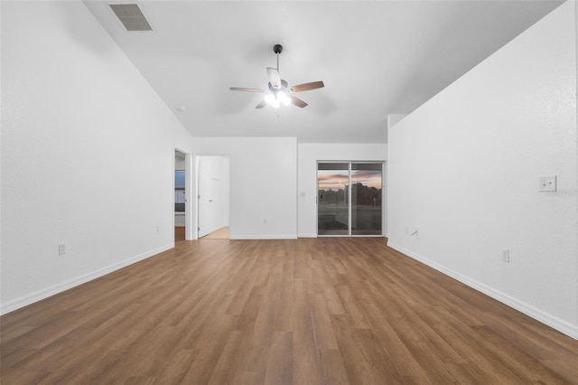 unfurnished living room featuring hardwood / wood-style flooring and ceiling fan