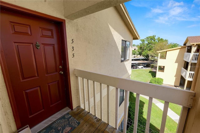 doorway to property with a balcony