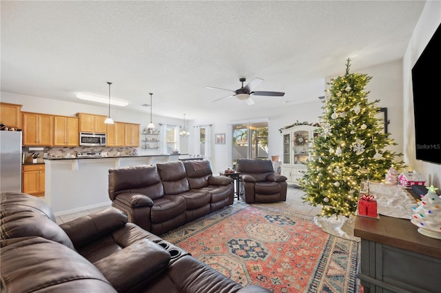 1849 Charleston Ln, Bartow, FL 33830 - living room featuring ceiling fan and light tile patterned floors