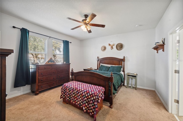 1849 Charleston Ln, Bartow, FL 33830 - bedroom with light carpet, baseboards, and a ceiling fan