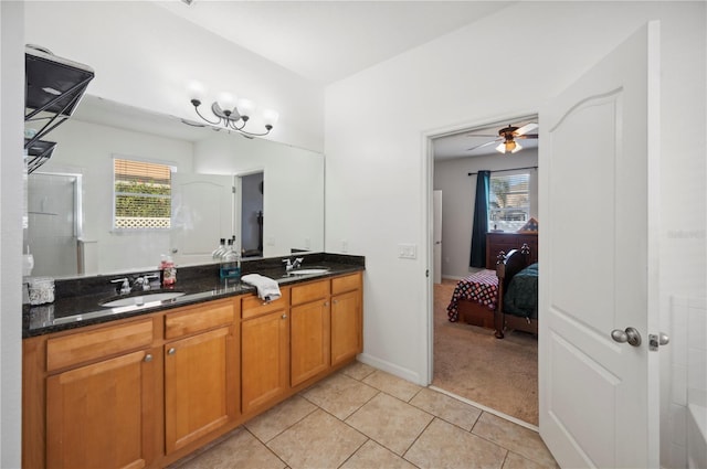 1849 Charleston Ln, Bartow, FL 33830 - ensuite bathroom with tile patterned floors, healthy amount of natural light, double vanity, and a shower