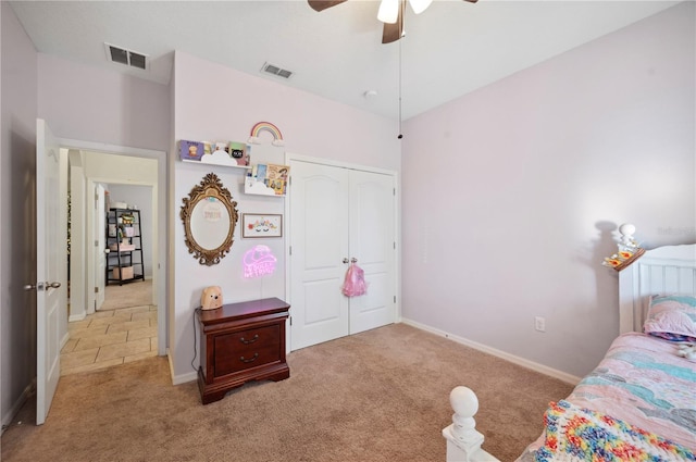 1849 Charleston Ln, Bartow, FL 33830 - carpeted bedroom featuring a closet, ceiling fan, and baseboards