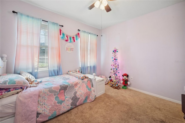 1849 Charleston Ln, Bartow, FL 33830 - carpeted bedroom with a ceiling fan and baseboards