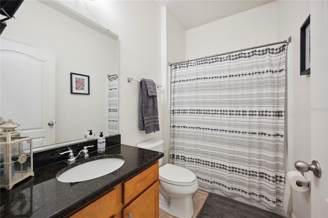1849 Charleston Ln, Bartow, FL 33830 - bathroom featuring toilet, vanity, a shower with shower curtain, and tile patterned floors