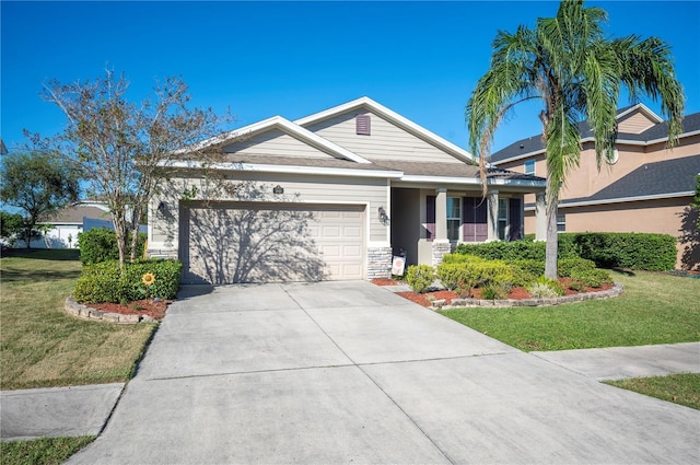 1849 Charleston Ln, Bartow, FL 33830 - single story home featuring an attached garage, a front yard, driveway, and stone siding