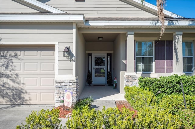 1849 Charleston Ln, Bartow, FL 33830 - property entrance featuring a garage and stone siding