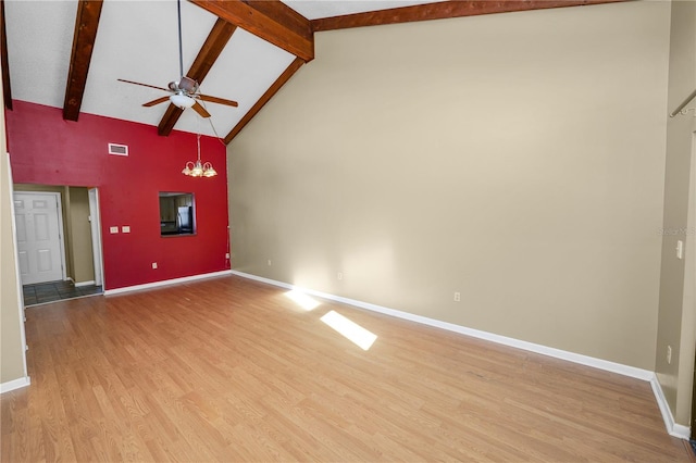 unfurnished living room with beamed ceiling, ceiling fan with notable chandelier, light hardwood / wood-style floors, and high vaulted ceiling