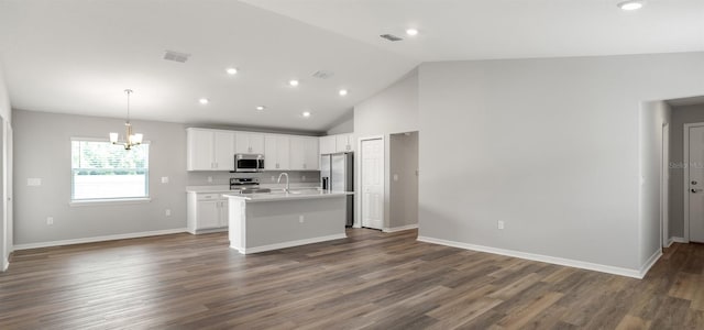 572 SW 77th Cir, Ocala, FL 34480 - kitchen with stainless steel appliances, open floor plan, a chandelier, light countertops, and recessed lighting