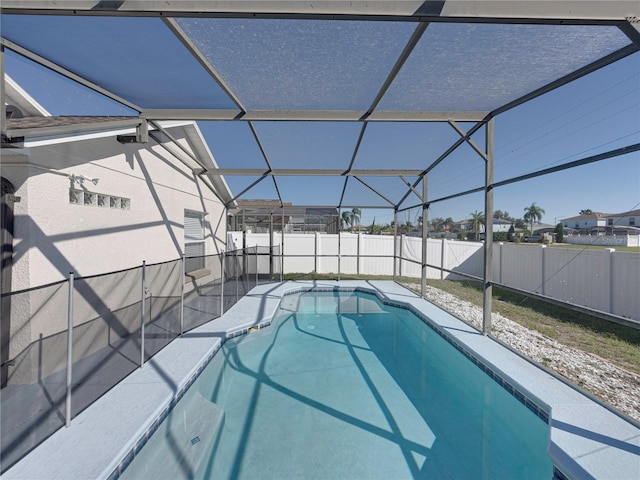 view of pool featuring a lanai