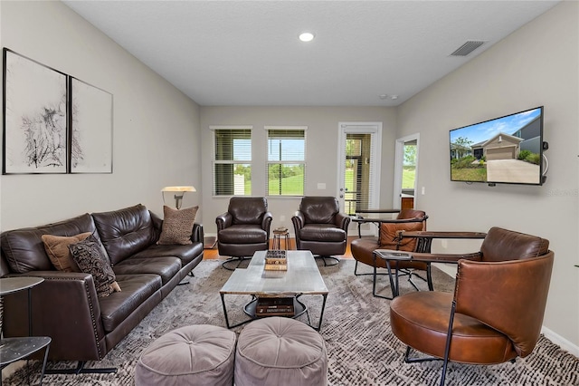 living room with light hardwood / wood-style flooring