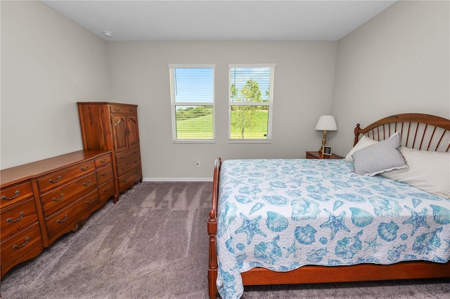 bedroom featuring light colored carpet