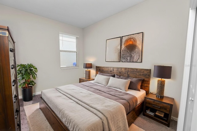 bedroom featuring carpet