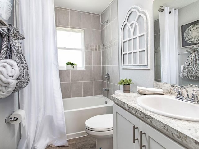 full bathroom with toilet, vanity, shower / bath combination with curtain, and wood-type flooring