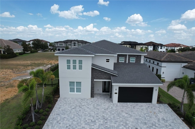 view of front of home featuring a garage