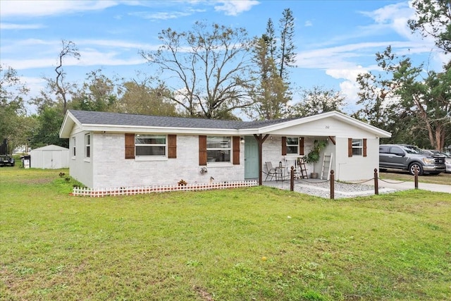 single story home featuring a patio area and a front lawn