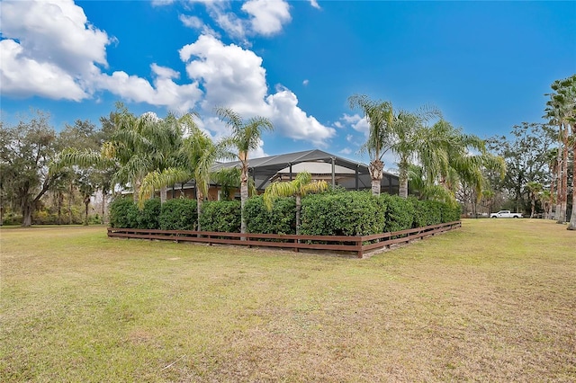 view of yard with a lanai