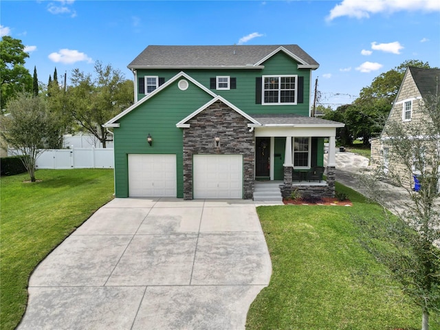 view of front facade with a garage and a front yard