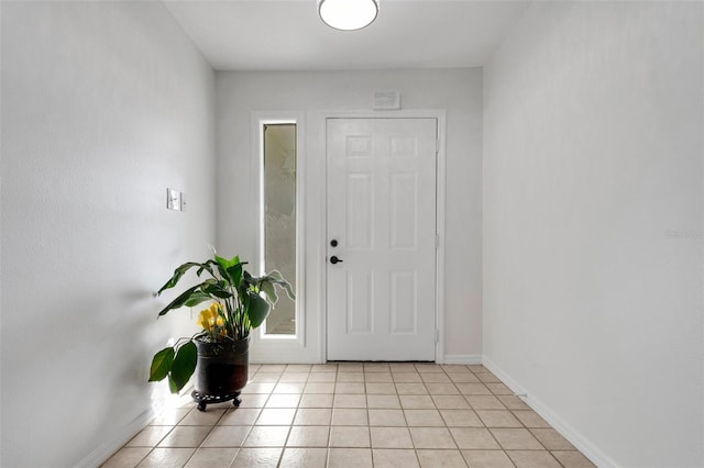 foyer with light tile patterned floors