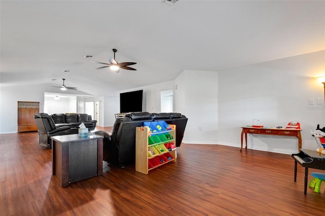 living room featuring ceiling fan, dark hardwood / wood-style flooring, and lofted ceiling