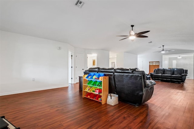 living room with ceiling fan and dark wood-type flooring