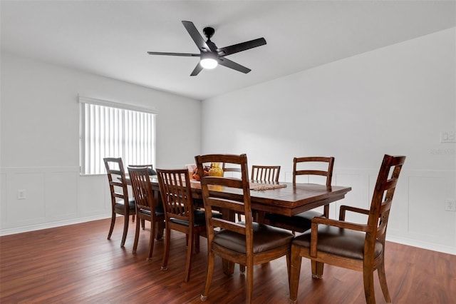 dining area featuring dark hardwood / wood-style floors and ceiling fan