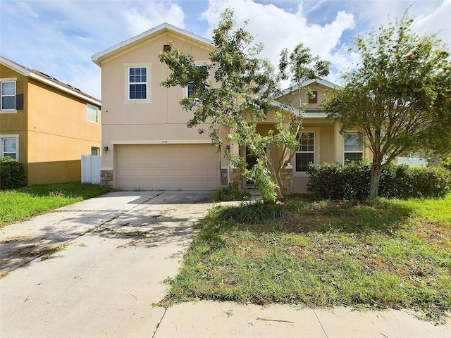 view of front of property featuring a garage