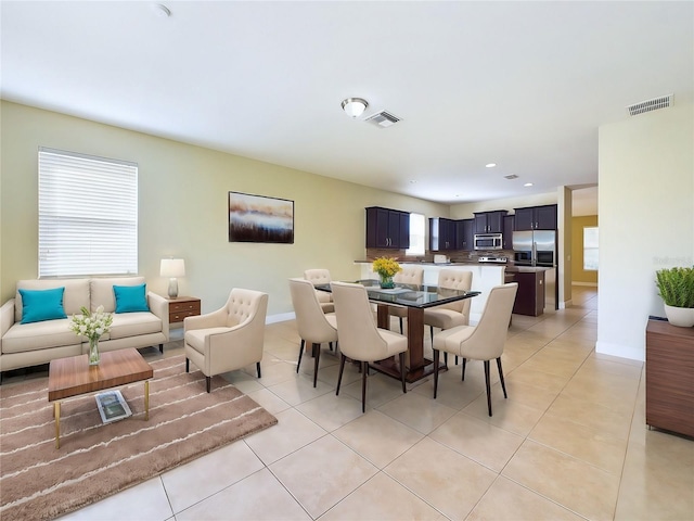 dining room with light tile patterned floors