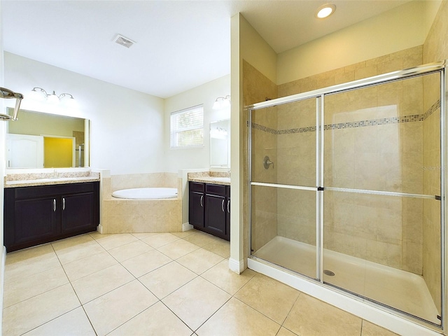 bathroom featuring separate shower and tub, tile patterned flooring, and vanity