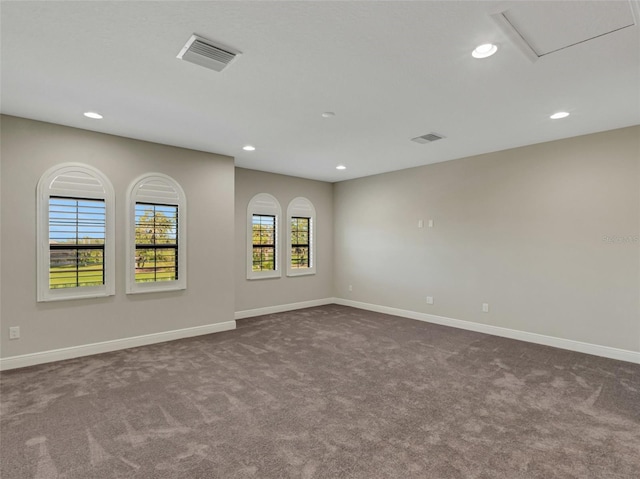 10469 Meadowrun Dr, Lithia, FL 33547 - unfurnished room with dark colored carpet, recessed lighting, and baseboards