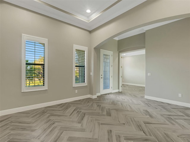 10469 Meadowrun Dr, Lithia, FL 33547 - unfurnished room featuring arched walkways, crown molding, baseboards, and recessed lighting