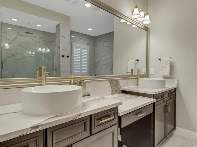 10469 Meadowrun Dr, Lithia, FL 33547 - full bathroom featuring marble look tile flooring, a marble finish shower, vanity, recessed lighting, and baseboards