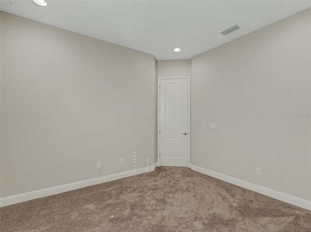 empty room featuring carpet floors