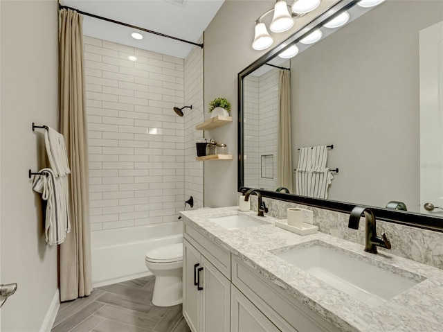 10469 Meadowrun Dr, Lithia, FL 33547 - full bath featuring shower / tub combo, toilet, double vanity, and baseboards