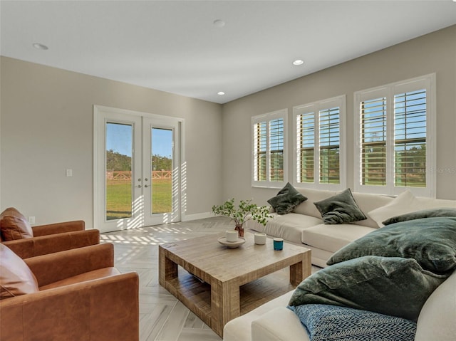 living room with french doors and light parquet flooring