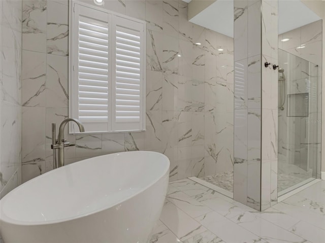 10469 Meadowrun Dr, Lithia, FL 33547 - bathroom with a marble finish shower, marble tiled floors, and a soaking tub