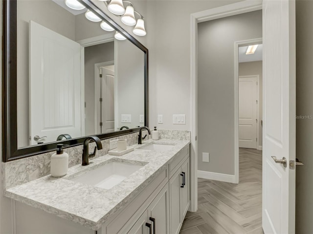 10469 Meadowrun Dr, Lithia, FL 33547 - full bathroom featuring double vanity and baseboards