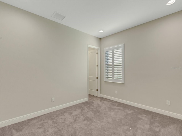 view of carpeted spare room