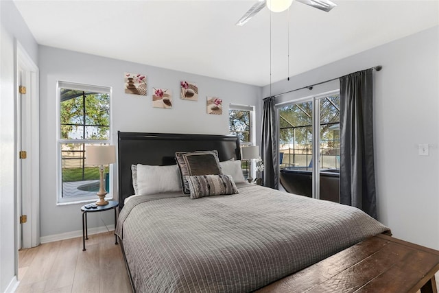 bedroom featuring ceiling fan and light hardwood / wood-style flooring