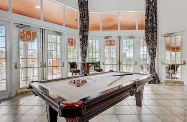 recreation room with french doors, a healthy amount of sunlight, and pool table