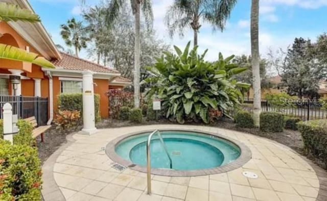 view of pool featuring a community hot tub