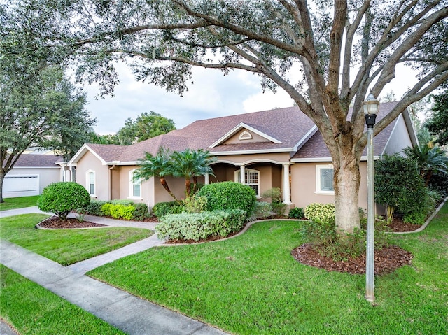 ranch-style home featuring a front yard