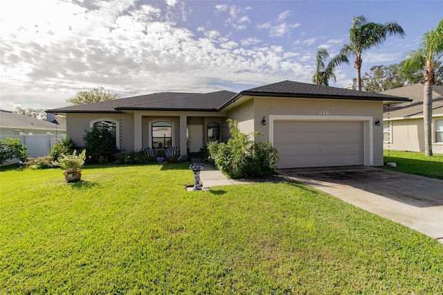 ranch-style home featuring a front yard and a garage