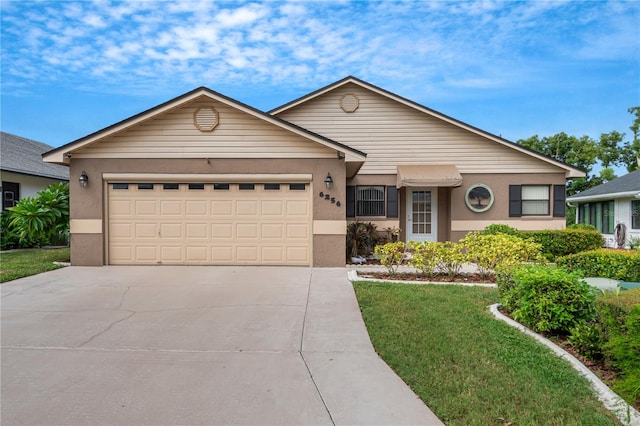 single story home with a garage